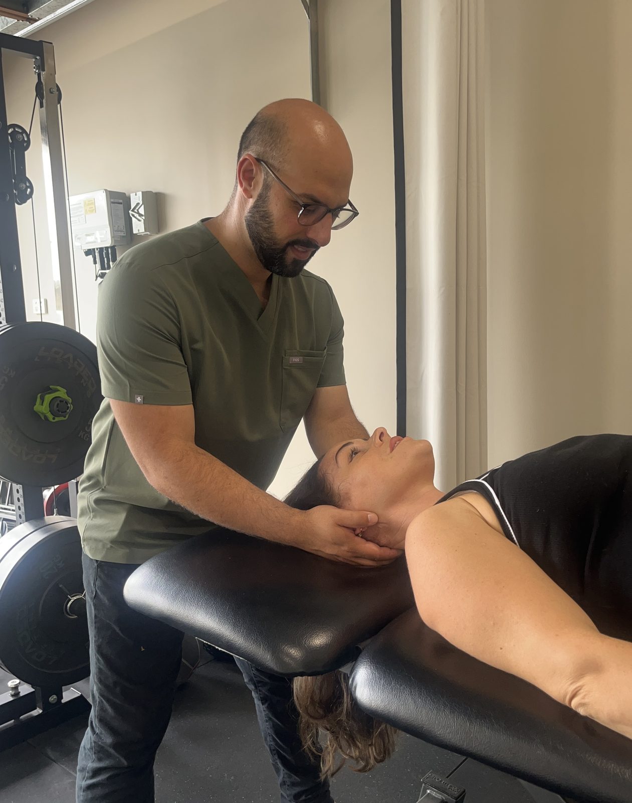 Matthew Babic performing physiotherapy treatment